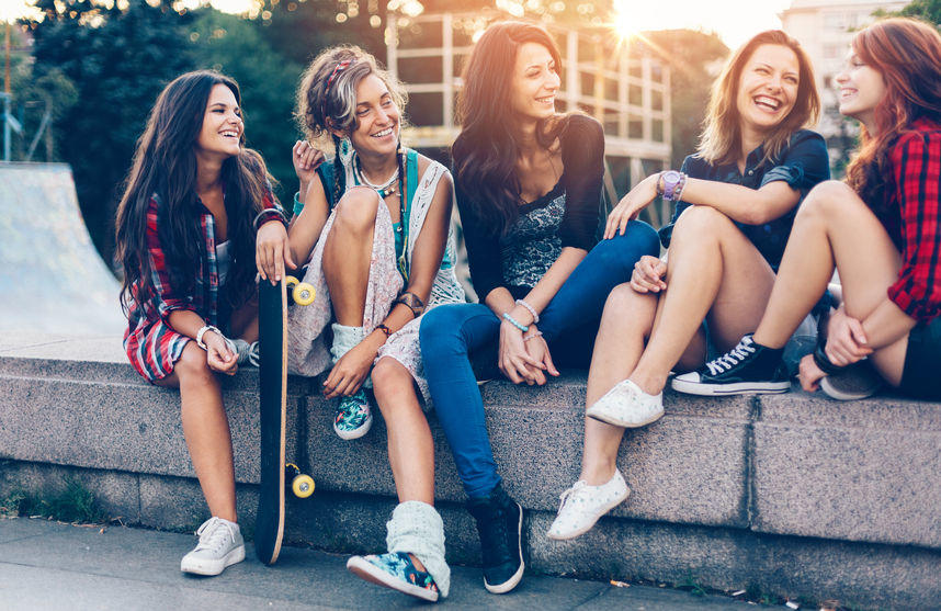 Girls sitting outside and talking